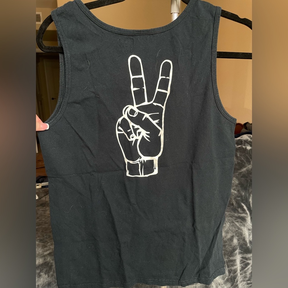 Black tank top, deuces sign, size small tank top but fits more like a medium